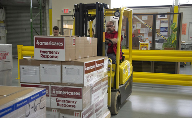 Americares employees prepare emergency supplies in the organization&rsquo;s Connecticut distribution center on Sept. 10, 2018, as Hurricane Florence intensifies. Photo courtesy of Americares. 