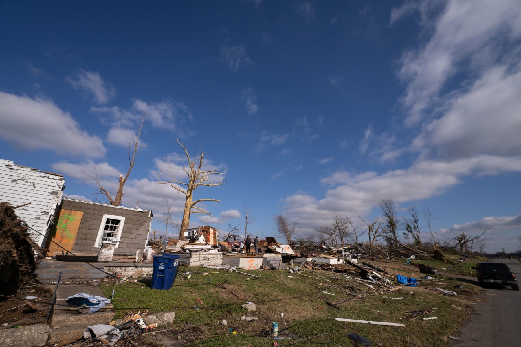 The Ramos family returns to the ruins of their home